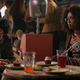 Susie (Lachlan Watson), left, grabs a cupcake with Rosalind (Jaz Sinclair)